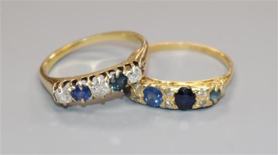 Two sapphire and diamond five stone rings, one stamped 18ct.